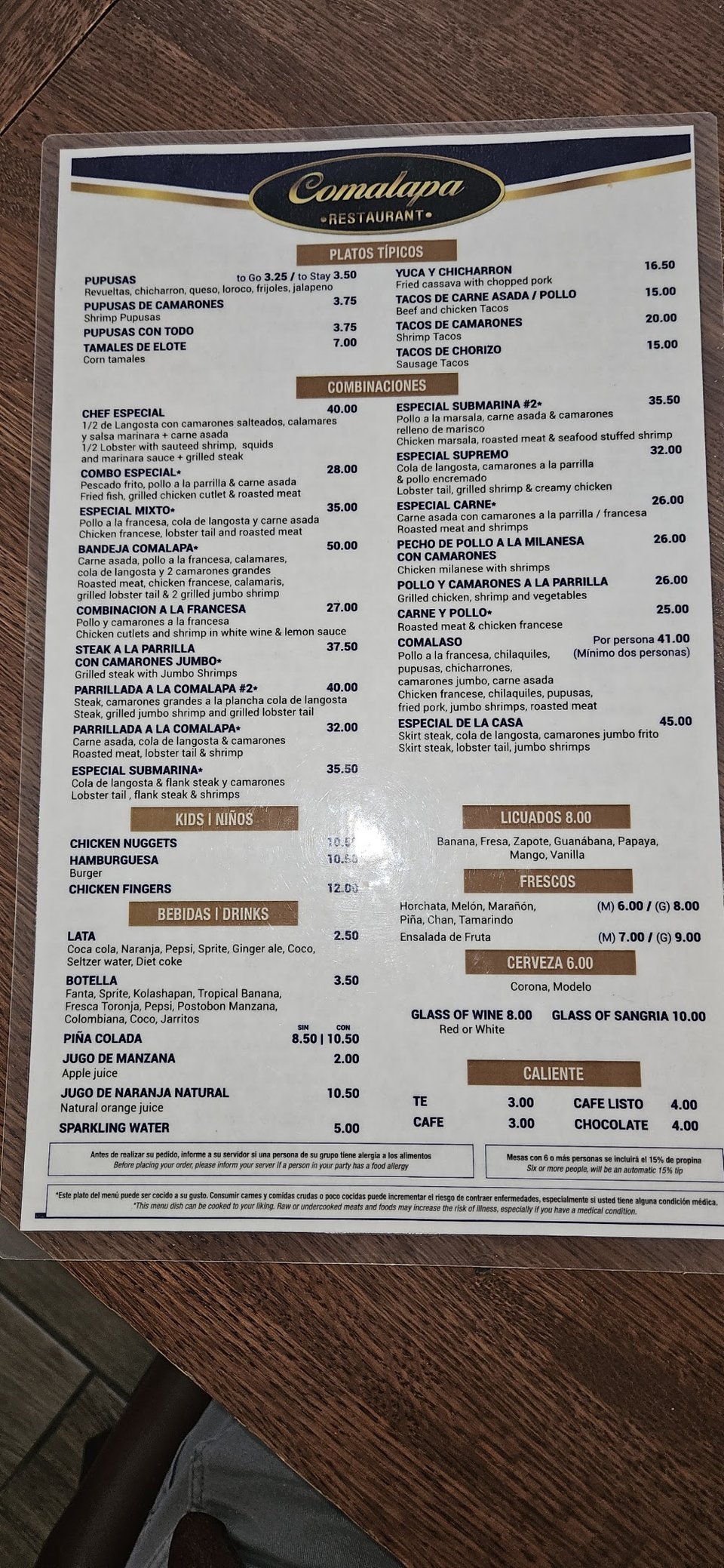 Printed menu featuring seafood and mains